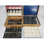 Soldiers - two wooden boxes containing a quantity of hand painted kit built military vehicles and