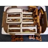 A good mixed lot of wooden push along toys predominantly boxed to include twenty wooden trailers