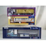 Corgi - three 1:50 scale diecast models comprising Tinnelly Int Transport,