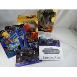 A good lot to include two Power Tec action figures from the Batman Begins series and nine model