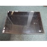 A wooden display case with clear plastic hinged lid,