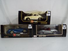 Diecast - three 1:18 scale models of Porsche motorcars comprising a Maisto Porsche Boxster,