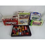 A good lot to include three model kits comprising an Airfix 1904 Mercedes,