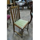 Set of four oak dining chairs on barley twist legs