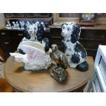 Pair of black and white Staffordshire style dog ornaments,