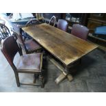 5' oak refectory style dining table on bulbous base together with four dining chairs with rexine