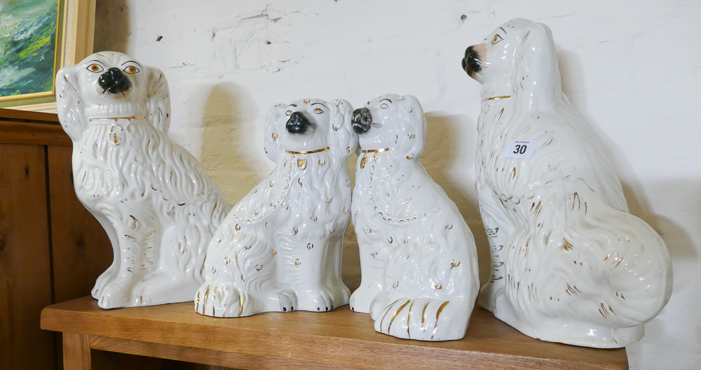 4 various white Staffordshire style dog figure ornaments