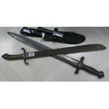 2 short broad swords and a bowie type knife plus one other in scabbard