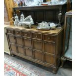 1950s 4' oak sideboard with fielded panel drawers and doors with low shelf back