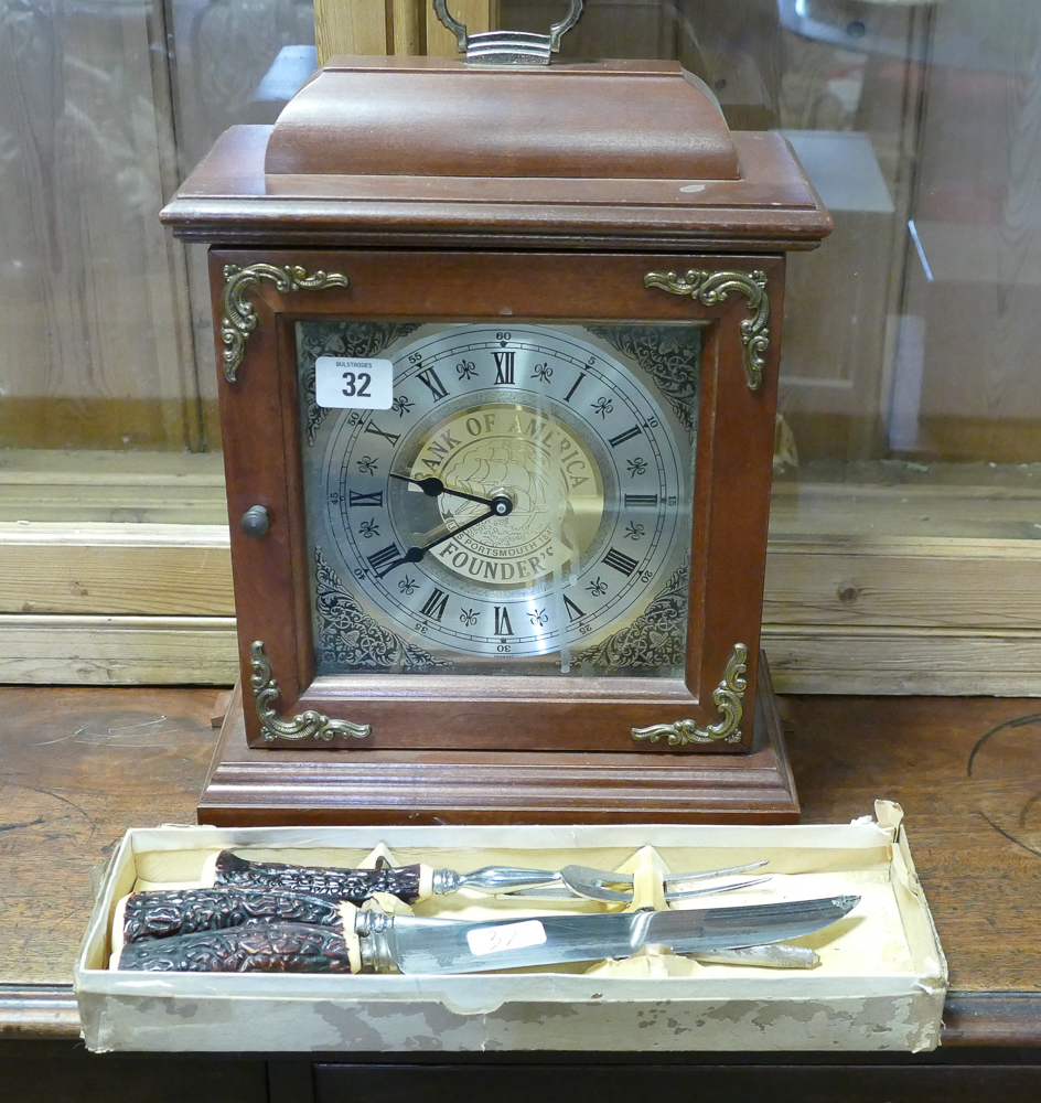 Reproduction bracket clock in mahogany case and a set of bone handled carvers