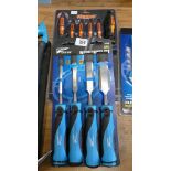 Set of four new carpenters chisels and 6 piece go through screwdriver set