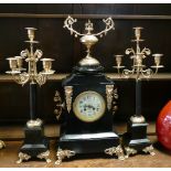 French black and gilt decorated 3 piece clock garniture