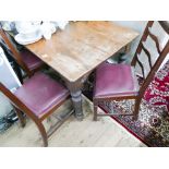 Victorian mahogany table with four chairs with mauve leather seats