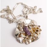 Victor Jansson 1970s chunky pendant in abstract style with amethyst crystals to the centre on a