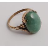 Oval Jade dress ring, claw set on 9ct gold shank.