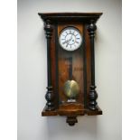 Victorian Vienna style striking wall clock in walnut and glass case