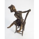 Contemporary green patinated bronze of a young girl seated on a chair - height 23cm