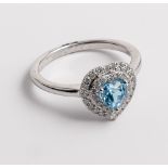 9ct gold aquamarine and diamond heart shaped cluster ring set in white gold shank.