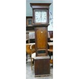 Early 19th century 8 day grandfather clock in oak case with painted dial by J Phillips Bromyard