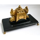 Empire style gilt mounted decorative desk inkstand on ebony base with brass claw feet