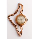 Ladies vintage 9ct rose gold cased wristwatch on gold plated flexible strap