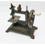 Late 19th century miniature iron sewing machine