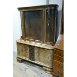 4' late 19th century Biedermeier style D shaped walnut display cabinet standing on a cupboard base