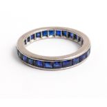 Full sapphire channel set eternity ring - size P