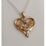 14ct yellow gold and diamond pendant "love" set with diamonds