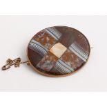 Late 19th century oval Scottish hardstone banded agate oval brooch in a yellow metal frame