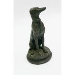 Green patinated bronze of a seated hound signed Barye - height is 18cm