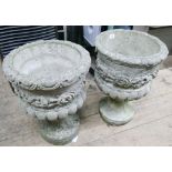 Pair of urn shaped concrete garden planters