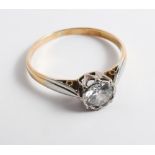 18ct yellow gold diamond single stone ring set with a brilliant cut diamond in an 18ct white gold