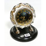 An Art Deco style glass mantle clock by Majak Russian 11 jewels on an ebony base