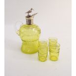 A lime green uranium glass decanter and 4 glasses,