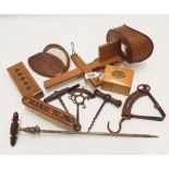 A collection of antique wooden ware, cork screws,