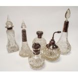 A collection 6 various cut glass and silver mounted scent bottles.