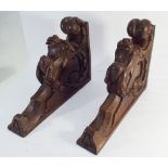 Pair of late Victorian carved oak decorative shelf brackets