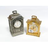 Small carriage clock in brass case and another in pewter case