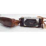 Vintage stereo realist camera in brown leather case