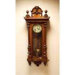 Victorian Vienna striking wall clock in walnut and glazed case