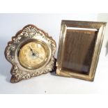 British United Clock Company silver mounted easel mantel clock and a hallmarked silver frame as