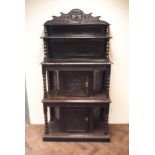 18th century and later carved oak tridarn style cabinet with fitted cupboards and shelves over -