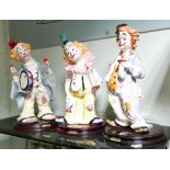 Three modern Italian Cevik models of clown musicians