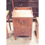 A Georgian mahogany commode made into a cupboard with drawer with tray top