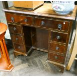 Reproduction mahogany small sized kneehole pedestal desk