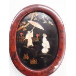 Pair of oval Japanese bone and mother of pearl inlaid plaques,