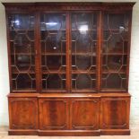 Georgian style mahogany break front library bookcase with lattice glazed doors and cupboards under