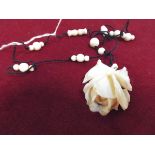 Victorian carved ivory rose flower head necklace with silk string mounted with beads