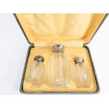 French cut glass and silver mounted cruet set in fitted case